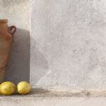 Rustic,Terracotta,Clay,Pot,Amphore,Vase,With,Fresh,Lemons,Against